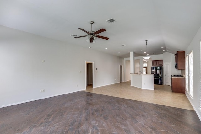 16223 Cotton Grove Ln, Houston, TX 77044 - unfurnished living room featuring ceiling fan, wood finished floors, recessed lighting, and lofted ceiling
