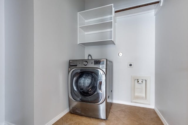 16223 Cotton Grove Ln, Houston, TX 77044 - laundry area featuring washer / clothes dryer and tile patterned floors
