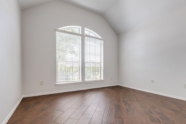 16223 Cotton Grove Ln, Houston, TX 77044 - spare room featuring plenty of natural light, dark wood-type flooring, and lofted ceiling