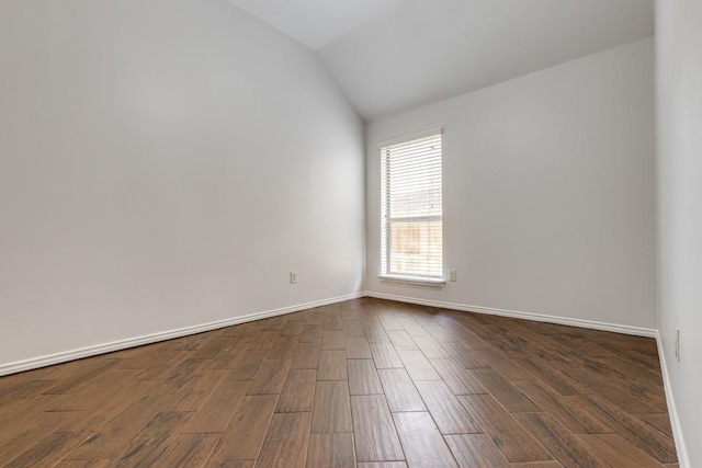 16223 Cotton Grove Ln, Houston, TX 77044 - spare room featuring vaulted ceiling and dark wood-style flooring