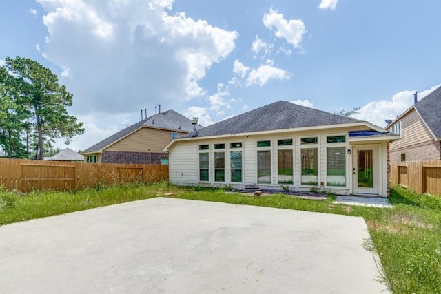 16223 Cotton Grove Ln, Houston, TX 77044 - rear view of house featuring a patio area and a fenced backyard