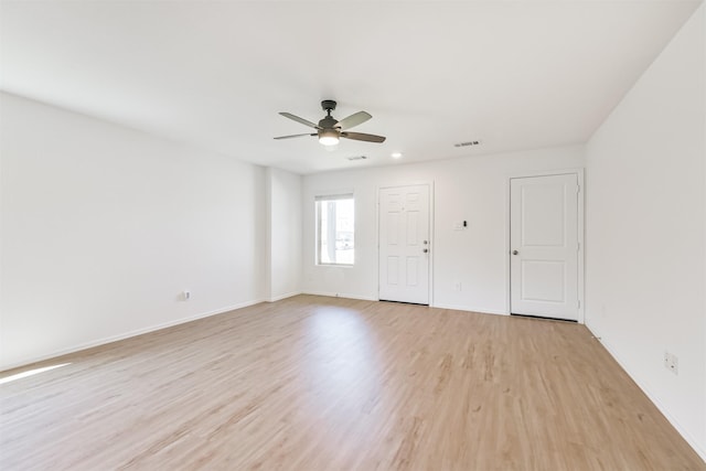 17427 Cyprian Cedar Ln, New Caney, TX 77357 - unfurnished room with light wood finished floors and ceiling fan