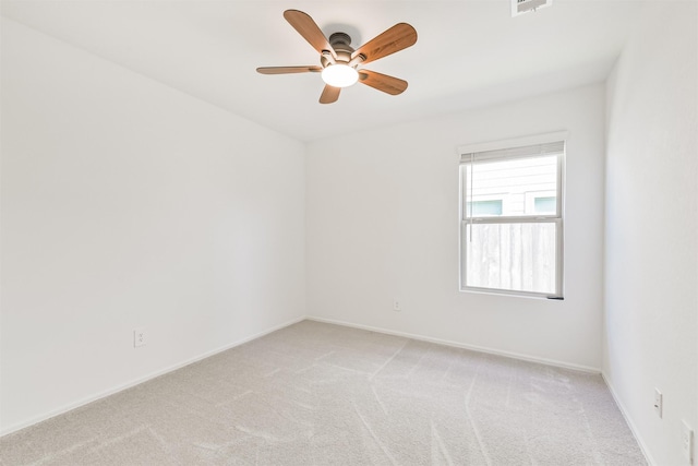 17427 Cyprian Cedar Ln, New Caney, TX 77357 - spare room featuring light colored carpet and ceiling fan
