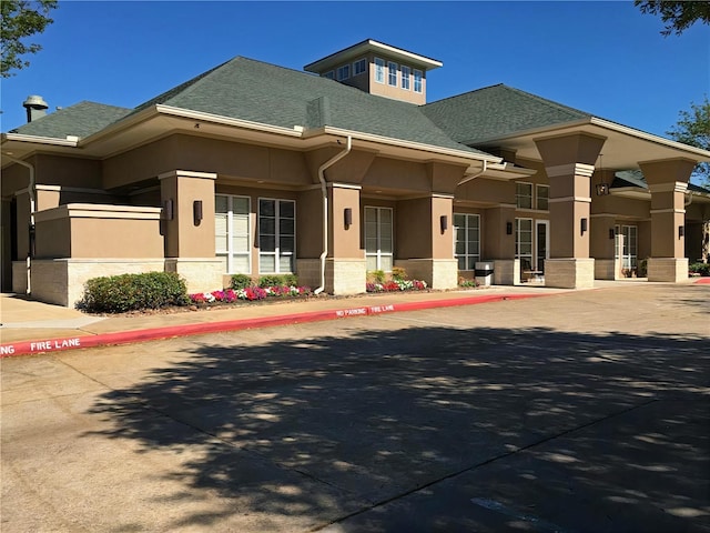 515 Silver Leaf Ct, Pearland, TX 77584 - view of front facade featuring stucco siding and roof with shingles