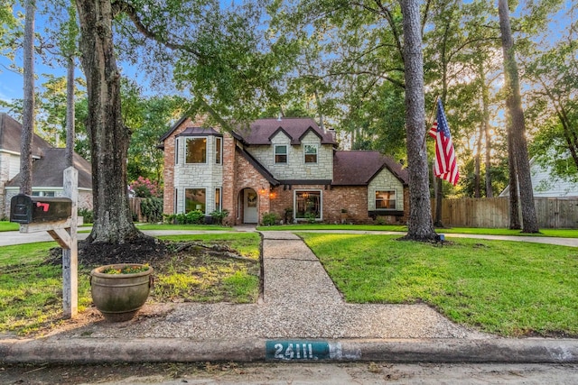 24111 Norchester Way, Spring, TX 77389 - tudor-style house featuring brick siding
