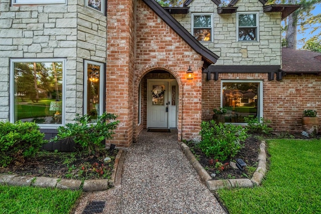 24111 Norchester Way, Spring, TX 77389 - entrance to property with brick siding, stone siding, and a shingled roof