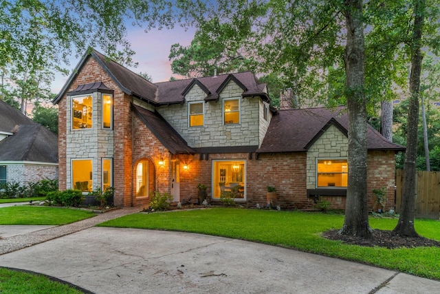 24111 Norchester Way, Spring, TX 77389 - view of front facade featuring stone siding and roof with shingles