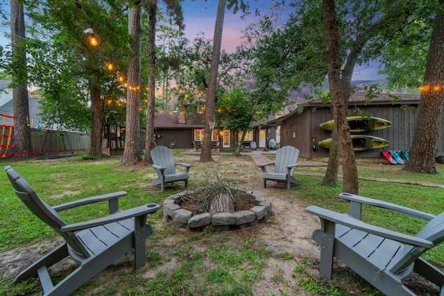 24111 Norchester Way, Spring, TX 77389 - view of yard featuring an outdoor fire pit