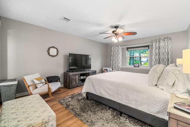 24111 Norchester Way, Spring, TX 77389 - bedroom with light wood finished floors and ceiling fan