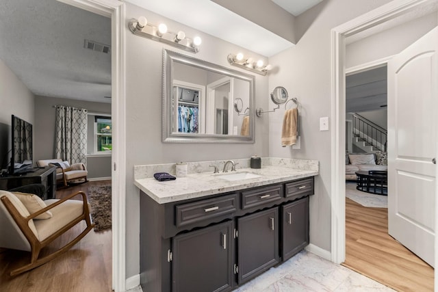 24111 Norchester Way, Spring, TX 77389 - bathroom featuring vanity and baseboards