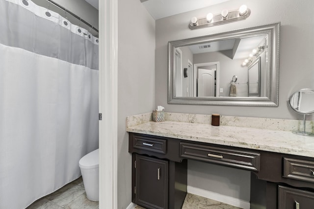 24111 Norchester Way, Spring, TX 77389 - full bathroom with marble look tile flooring, vanity, and curtained shower