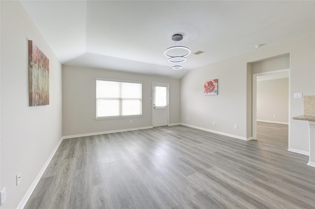 9207 Ranch Ridge Ln, Richmond, TX 77407 - empty room featuring wood finished floors and baseboards