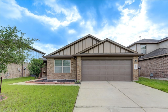 9207 Ranch Ridge Ln, Richmond, TX 77407 - tudor house featuring board and batten siding, concrete driveway, a front lawn, and brick siding