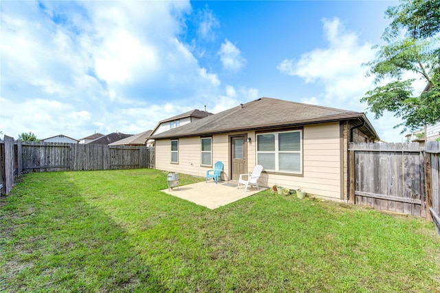 9207 Ranch Ridge Ln, Richmond, TX 77407 - back of property with a patio area and a fenced backyard
