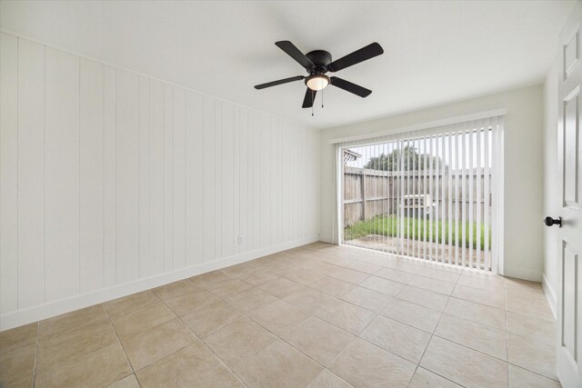 7822 Pacific Pearl St, Houston, TX 77072 - spare room featuring light tile patterned flooring and ceiling fan
