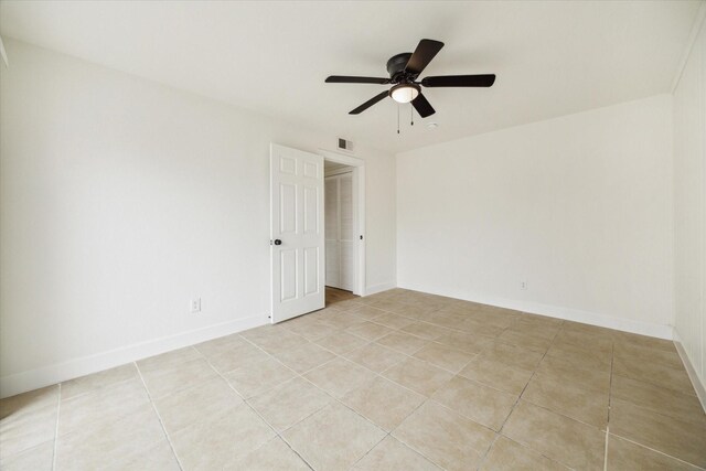 7822 Pacific Pearl St, Houston, TX 77072 - empty room featuring light tile patterned floors and a ceiling fan