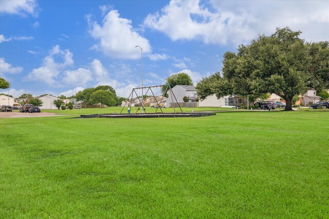 7822 Pacific Pearl St, Houston, TX 77072 - view of community featuring a lawn