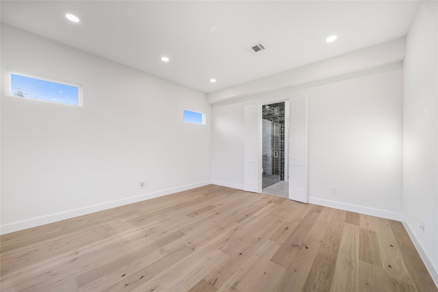 8646 Alcott Dr, Houston, TX 77080 - empty room featuring light wood-style flooring and recessed lighting