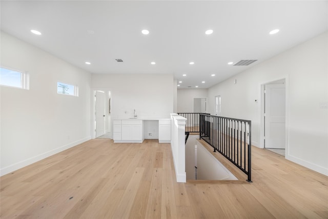 8646 Alcott Dr, Houston, TX 77080 - spare room featuring light wood finished floors and recessed lighting