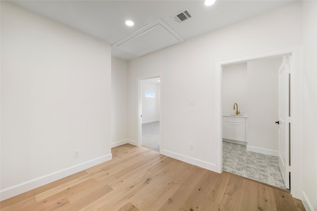 8646 Alcott Dr, Houston, TX 77080 - unfurnished room featuring attic access, light wood-type flooring, and recessed lighting
