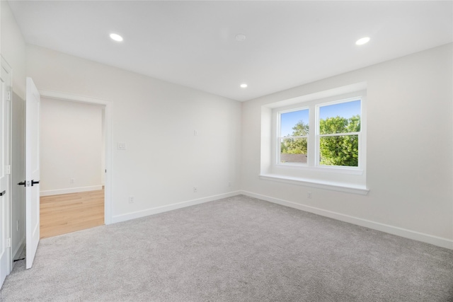 8646 Alcott Dr, Houston, TX 77080 - unfurnished room featuring light carpet and recessed lighting