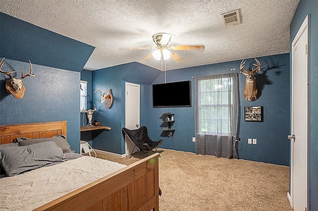 541 N Village Creek Pkwy, Lumberton, TX 77657 - carpeted bedroom with a textured ceiling, ceiling fan, and a textured wall