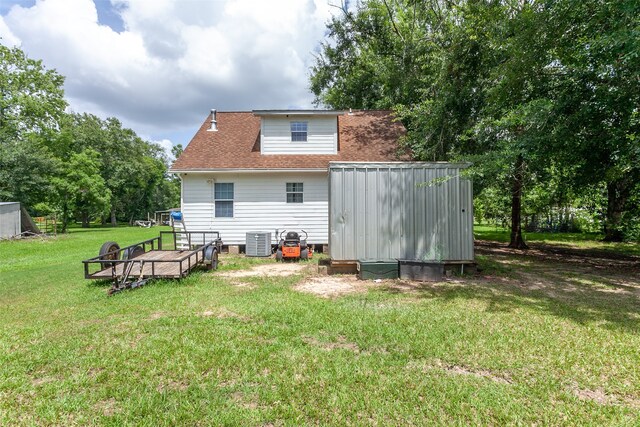 541 N Village Creek Pkwy, Lumberton, TX 77657 - back of property with a yard