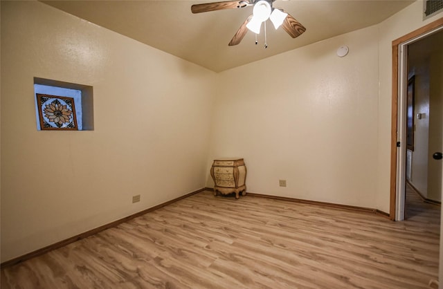 507 W Fawn St, Caldwell, TX 77836 - empty room with light wood-style flooring, ceiling fan, and a smoke detector