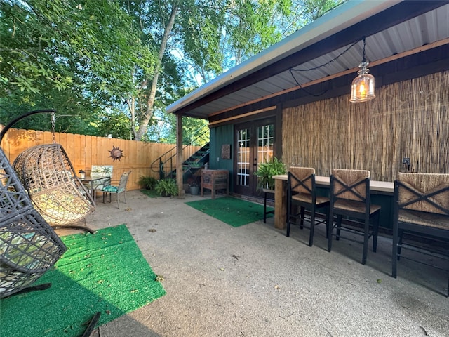 507 W Fawn St, Caldwell, TX 77836 - view of patio with french doors and outdoor dining space