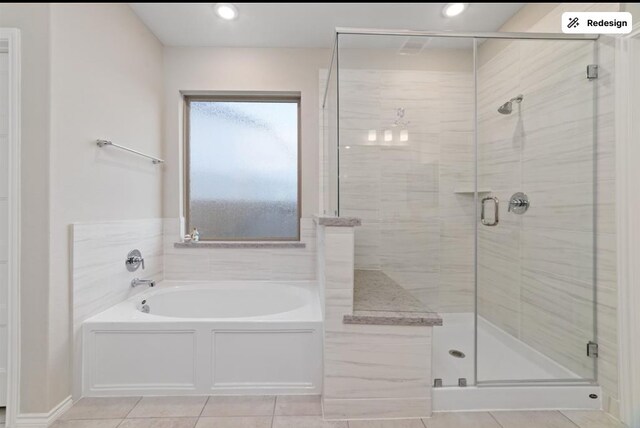 8922 Granary Gate Ln, Richmond, TX 77407 - full bathroom with a garden tub, a stall shower, and tile patterned flooring