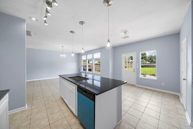 6306 Channelbrook Ln, Spring, TX 77379 - kitchen featuring dishwasher, dark countertops, light tile patterned floors, white cabinetry, and decorative light fixtures