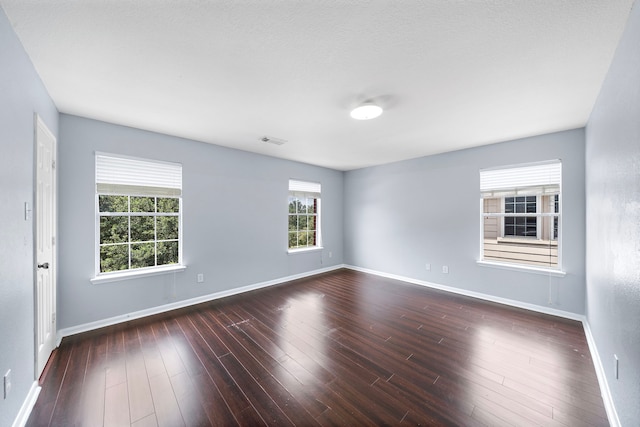 6306 Channelbrook Ln, Spring, TX 77379 - empty room featuring baseboards and wood finished floors