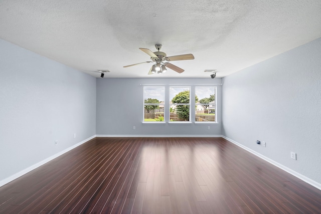 6306 Channelbrook Ln, Spring, TX 77379 - unfurnished room featuring a ceiling fan, dark wood finished floors, and a textured ceiling