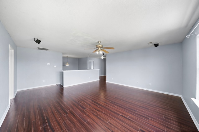 6306 Channelbrook Ln, Spring, TX 77379 - unfurnished living room featuring a ceiling fan and dark wood finished floors