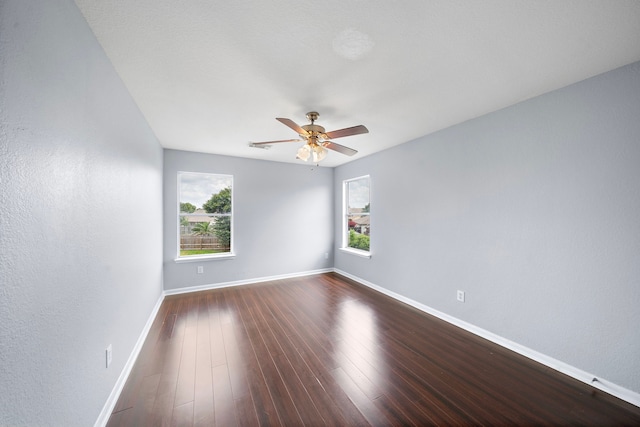 6306 Channelbrook Ln, Spring, TX 77379 - unfurnished room featuring ceiling fan and dark wood-style flooring