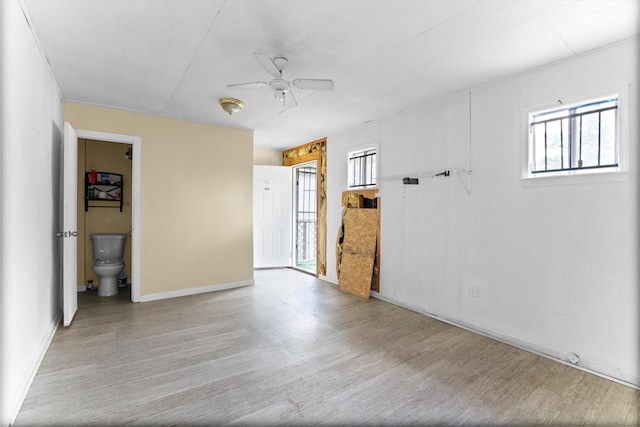 1028 N Victory Dr, Houston, TX 77088 - empty room with wood finished floors and a ceiling fan