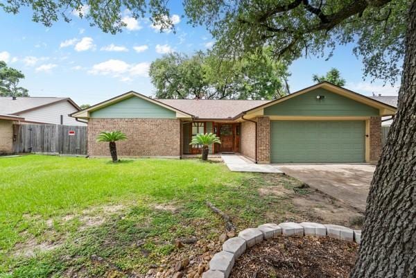 14419 Crosshaven Dr, Houston, TX 77015 - view of front of property with brick siding, a garage, and driveway