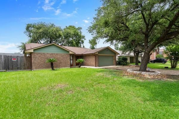 14419 Crosshaven Dr, Houston, TX 77015 - ranch-style house with driveway, a garage, and brick siding
