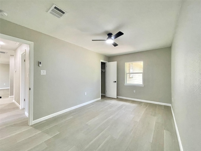 5039 Briscoe St, Houston, TX 77033 - unfurnished bedroom with light wood finished floors and ceiling fan