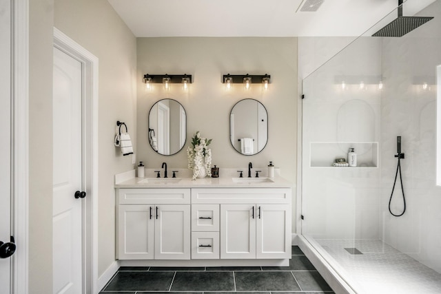 4101 E Rogers St, Houston, TX 77022 - full bathroom with a tile shower, double vanity, and tile patterned floors