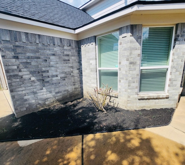 3154 Thicket Path Way, Katy, TX 77493 - view of home's exterior with roof with shingles and brick siding