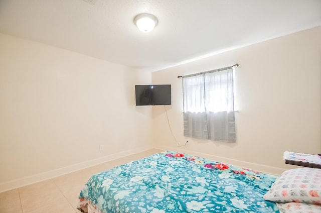 12806 Bauman Rd, North Houston, TX 77037 - bedroom featuring baseboards
