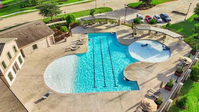 3506 Lake Bella Megan Dr, Katy, TX 77493 - community pool featuring a patio area