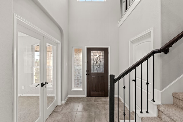3506 Lake Bella Megan Dr, Katy, TX 77493 - foyer entrance with stairs, french doors, and a towering ceiling