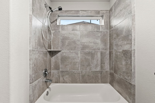 3506 Lake Bella Megan Dr, Katy, TX 77493 - bathroom with tub / shower combination and a textured wall