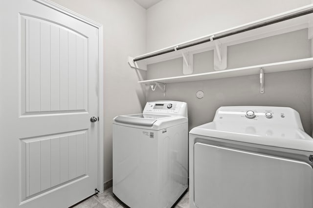 3506 Lake Bella Megan Dr, Katy, TX 77493 - laundry area with washer and clothes dryer