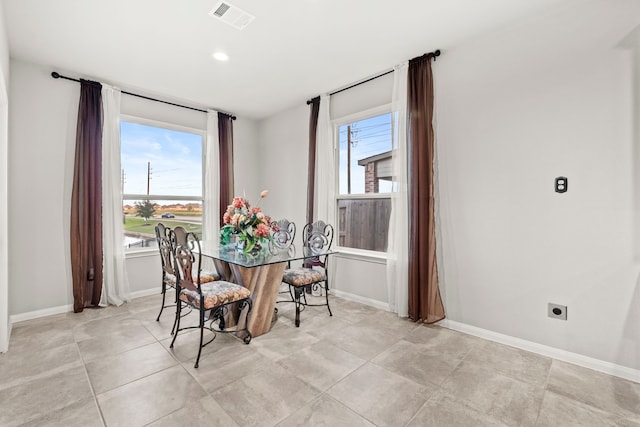3506 Lake Bella Megan Dr, Katy, TX 77493 - dining space with plenty of natural light and light tile patterned flooring