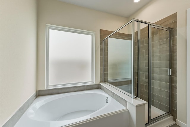 2231 Bright Sunrise Trl, Fresno, TX 77545 - bathroom featuring a stall shower and a bath