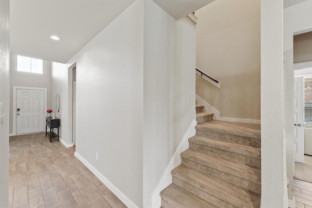 2231 Bright Sunrise Trl, Fresno, TX 77545 - stairs featuring wood finished floors and recessed lighting