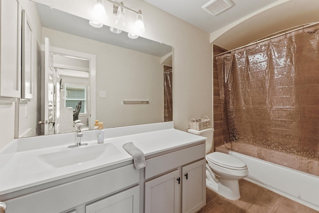 2231 Bright Sunrise Trl, Fresno, TX 77545 - bathroom featuring vanity, shower / tub combo with curtain, and wood finished floors
